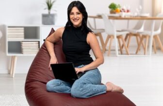 Amazon Brand – Solimo Premium Faux Leather Triangle Bean Bag, Filled with Beans | Capacity: Upto 6 Ft 3 in Height, 120 Kg Weight | Tan